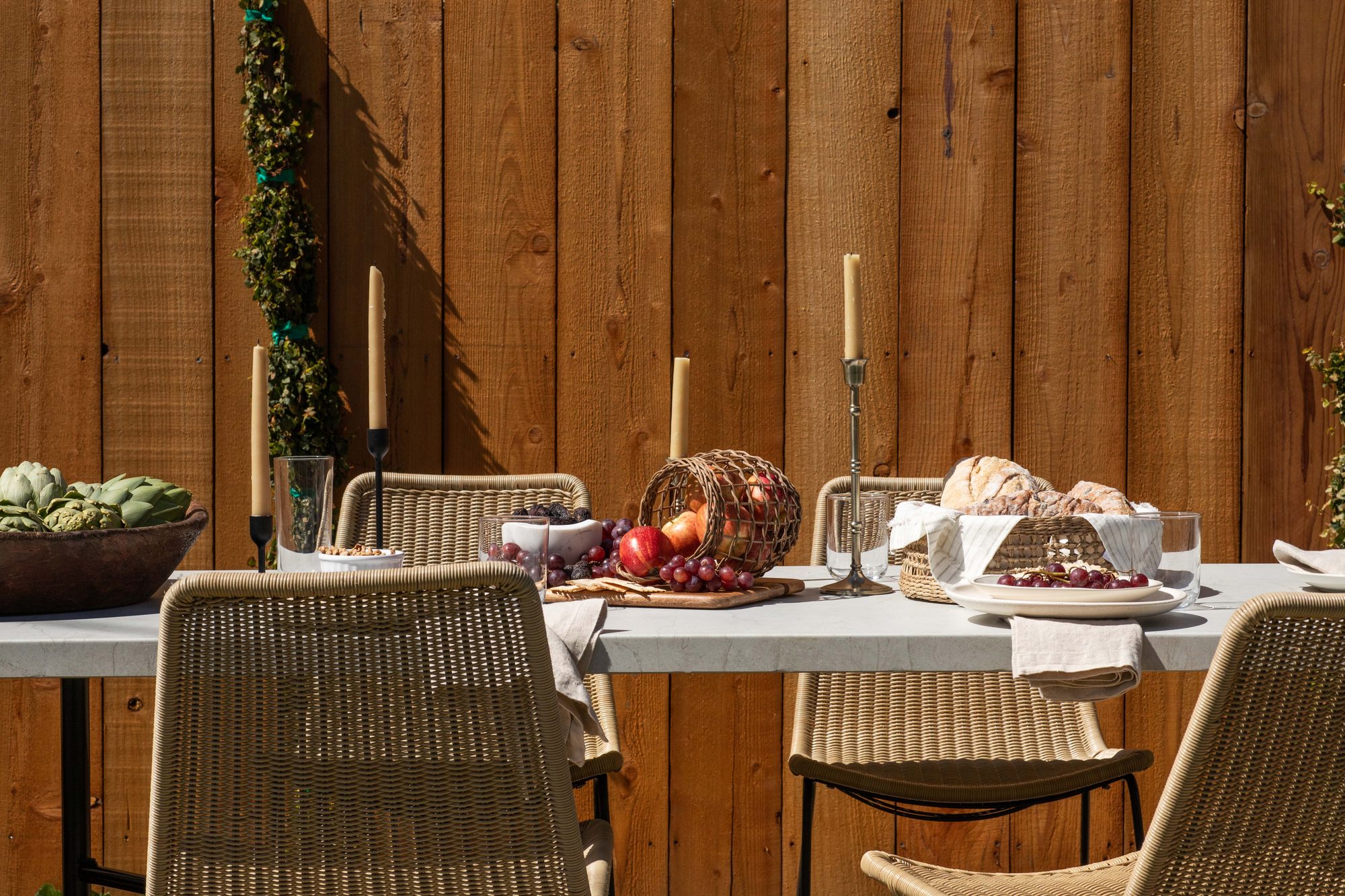 The back garden dining table set for a meal at The Craft House Inn